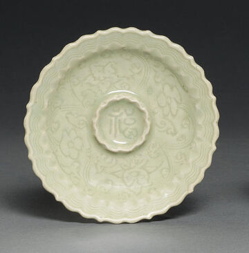 A Longquan Celadon Carved Cup Stand