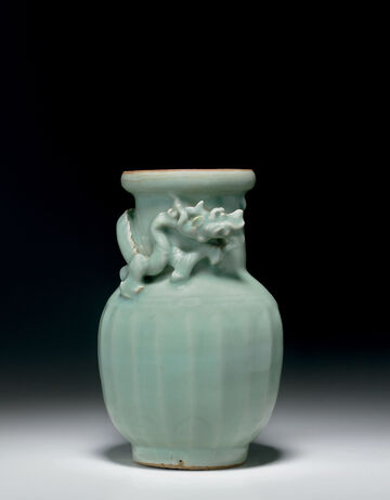 A Rare Carved Longquan Celadon Jar