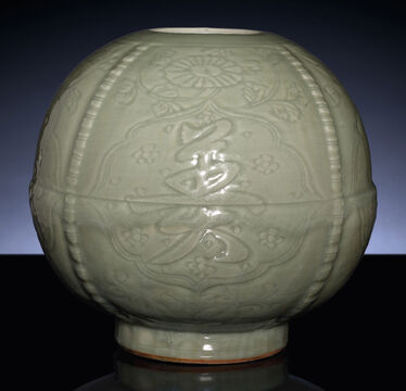 A Very Rare Early Ming Longquan Celadon Carved Jar