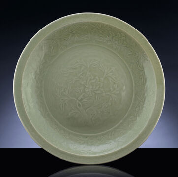 A Rare Early Ming Massive Carved Longquan Celadon Charger
