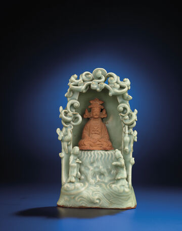 A Longquan Celadon And Biscuit Grotto With Guanyin And Acolytes