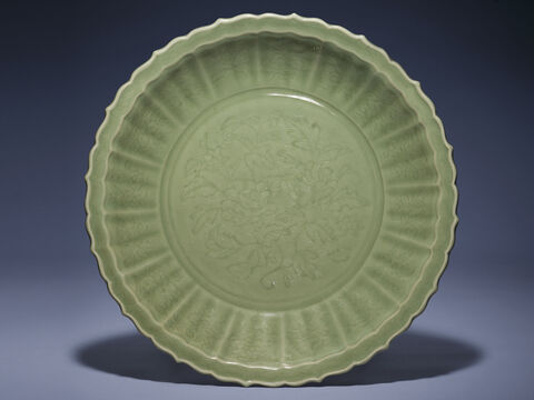 A Large Longquan Celadon 'Peony' Barbed-Rim Dish