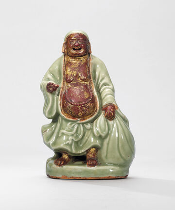 A Longquan Celadon Figure Of Budai
