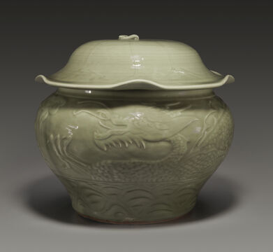 A Rare Longquan Celadon Carved Jar And Cover
