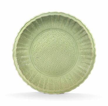 A Large Carved And Moulded Longquan Celadon-Glazed Barbed-Rim Dish