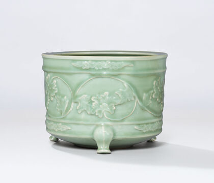 A Moulded Longquan Celadon Tripod Censer