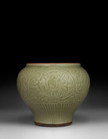 A Carved Longquan Celadon 'Lotus' Jar