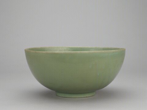 青釉刻花锦纹碗