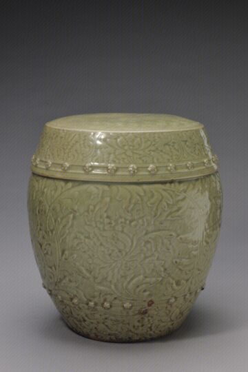 青釉缠枝花纹绣墩