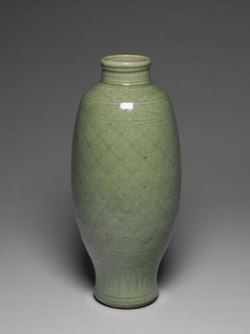 Olive-shaped vase with incised floral and latticework design