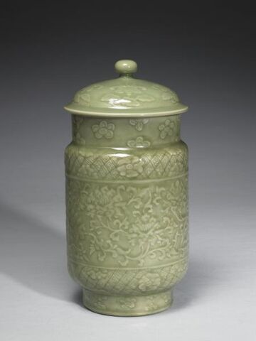 Lidded jar with raised floral decoration