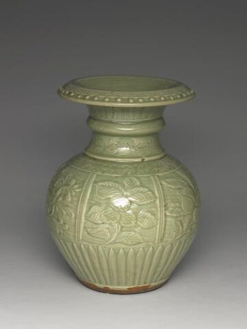 Pomegranate-shaped zun vessel with raised flower and fruit decoration