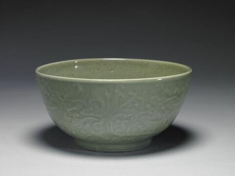 Bowl with raised Indian lotus scrolls