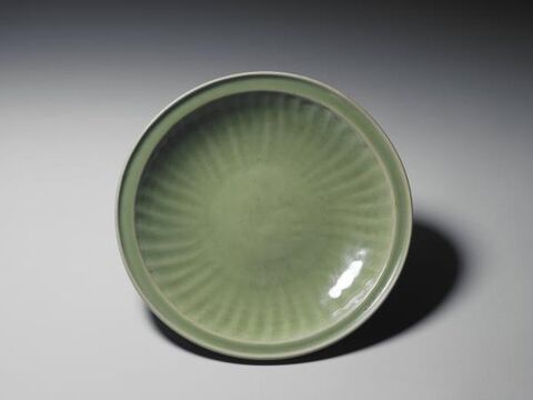 Angled-rim dish with impressed floral decoration
