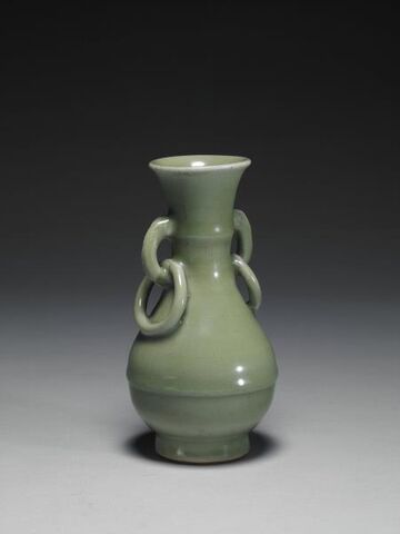 Vase with animal-mask ring handles