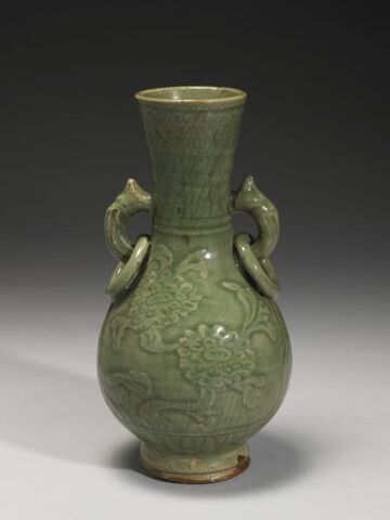 Vase with animal-mask ring handles and incised floral decoration