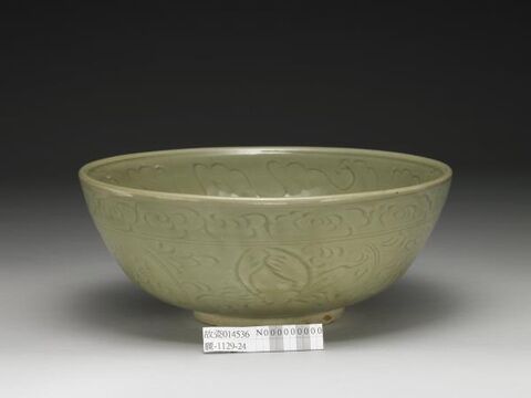 Bowl with incised peony and waves decoration