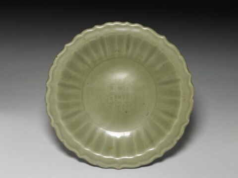 Foliate-rimmed dish with impressed decoration