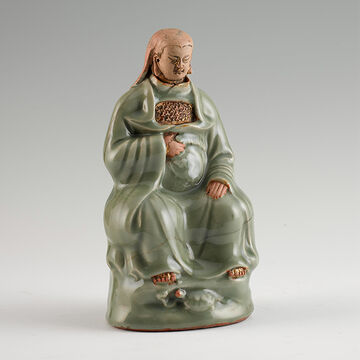 青釉描金真武像