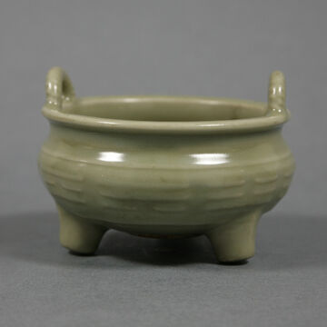 青釉八卦纹三足炉